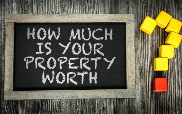 How Much is Your Property Worth? written on chalkboard